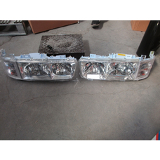 Фара HOWO SINOTRUK Левая WG9100720110